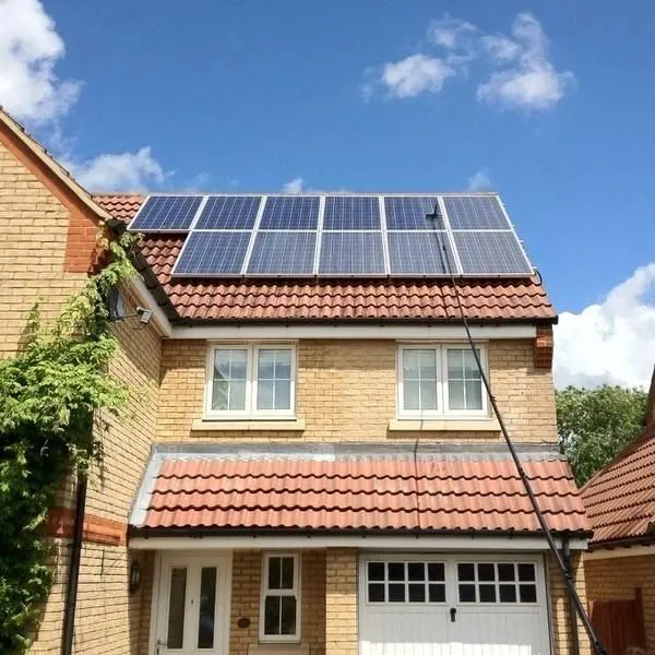 House with a row of solar panels on the roof
